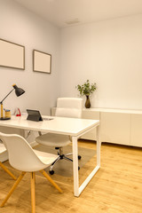 Fully equipped modern dental clinic office, with glass maps, numbered white walls and wooden floor.