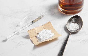 cocaine in paper and equipment on marble background with a blank space for a text, Background from cocaine party