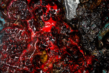 macro of red red oil paint