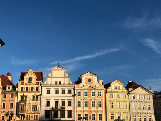 Fototapeta na wymiar old buildings under clear blue sky