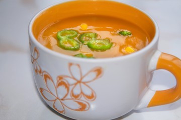 Vegetable soup on stone table