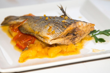 stewed fish dish with potatoes and peppers