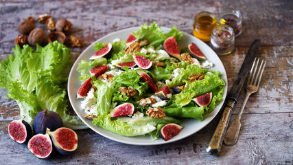 Green salad with figs and white cheese. Keto salad. Keto diet.