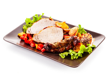 Roast chicken steaks and vegetable salad