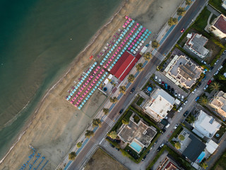 Top view of a beach relaxation area with beach umbrellas. Terracina, Latin Province, Lazio, Italy
