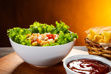 Fried cod and vegetables with french fries