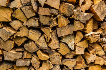 Chopped wood stacked in rows