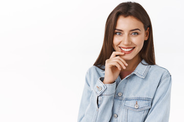 Close-up portrait attractive sensual, feminine woman with lovely smile, touching lip and giggle...