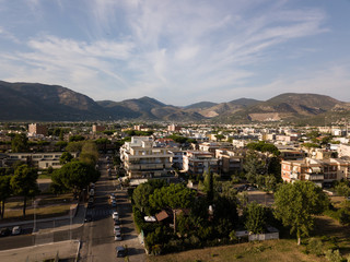 Fototapeta na wymiar View of the city against the backdrop of the mountains. Terracina, Province of Latina, Lazio Region, Italy