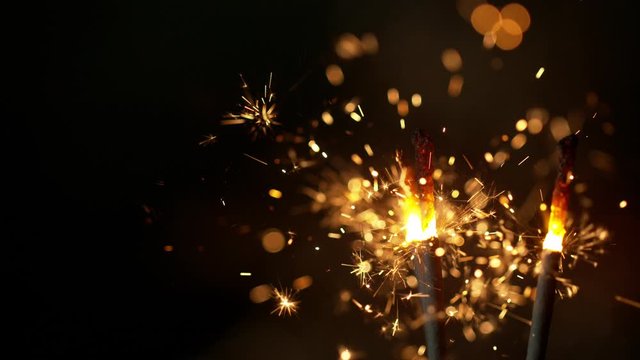 Super Slow Motion Romantic Sparkler Background at 1000fps. Shooted with High Speed Cinema Camera in 4K Resolution