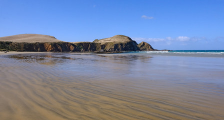 Surat Bay beach at low tide, Catlins, Southland, New Zealand