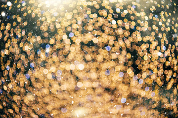 Defocused Christmas themed background with snowflakes. Christmas market theme.
