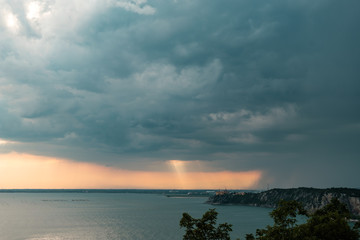 Fototapeta na wymiar Sunset storm in the sky over Trieste