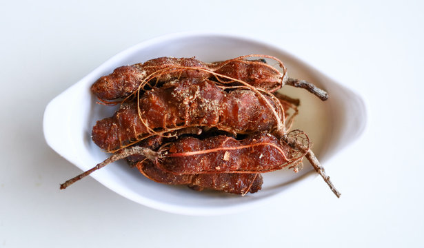 Tamarind or Tamarindus indica on white background.  