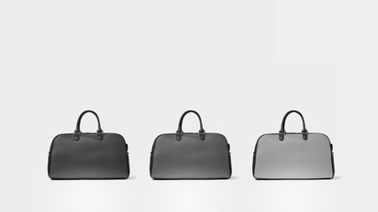 Group of three fashionable grey leather bowling bags