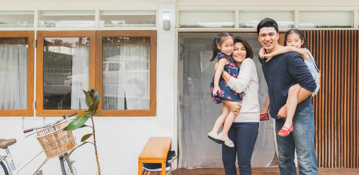 Portrait Asian Family Front Of House, Happy Family Home Concept