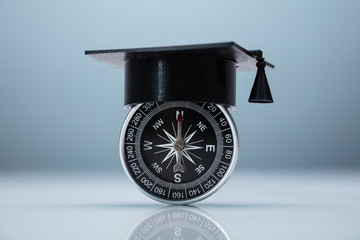 Graduation Cap On Compass