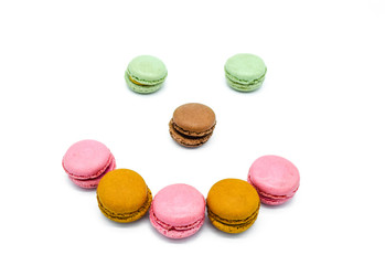 macarons in shape of face, isolated on white background