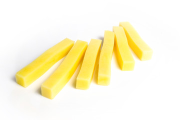 Unfinished raw french fries on a white background isolate