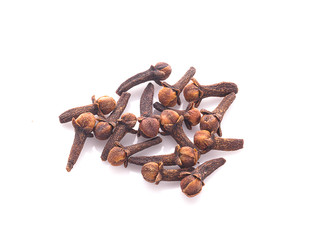 dry cloves on white background