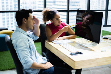 designers team working modern. creative manager showing new project idea monitor.