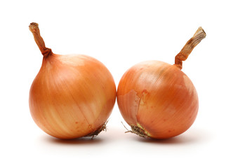 Gold onion vegetable bulbs on white background