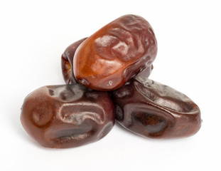Fresh dates over white background