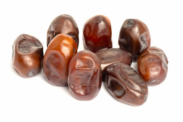Fresh dates over white background