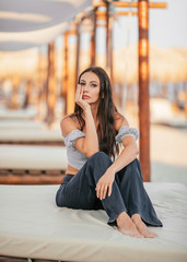 Woman sitting on the beach
