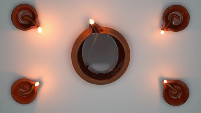 Festival lamps placed on corners against lighter background