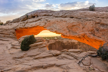 mesa arch at sunrise with vibrant colours