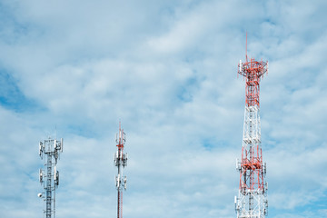 Telecommunications tower with soft cloudy on bulky background, Satellite dish telecom network for...