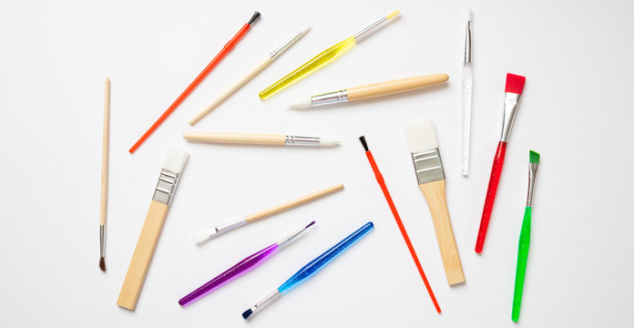 Paint brushes new clean isolated against white background.