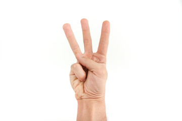 man's hand shows three fingers on a white background