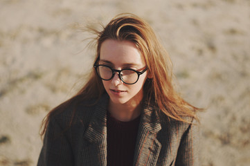 Woman with glasses, woman on the beach