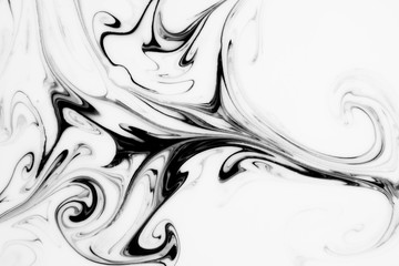 Abstract painting technique Ebru .Turkish style Ebru on the water with acrylic paints press waves.Modern art marble liquid texture