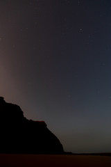 Night sky under the cliffs in Portugal