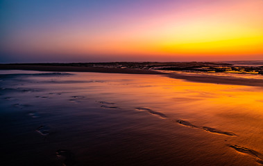 Sunset on the beach in Algarve, Portugal