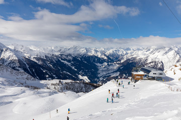Fototapeta na wymiar Skiing resort and Austrian Alps
