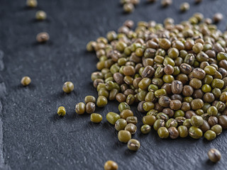 Mash soy bean grains are on the surface of the shale.