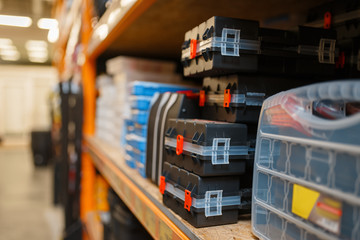 Hardware store assortment, shelf with toolboxes