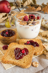 autumnal food background with rusks and jam
