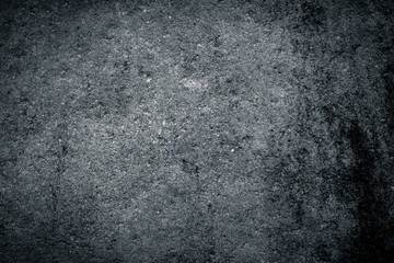 Texture of dark grey concrete wall with rough surface