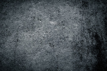 Texture of dark grey concrete wall with rough surface