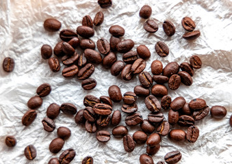 Roasted coffee beans on white background