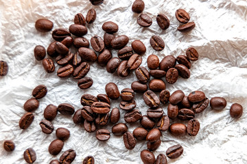 Roasted coffee beans on white background