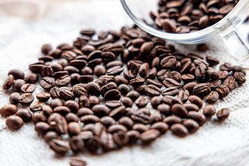Roasted coffee beans on white background
