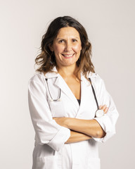 Fototapeta na wymiar Female doctor with white coat