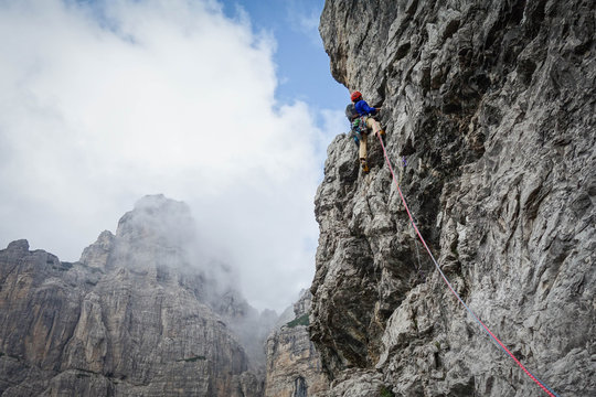 rock climbing man hiking Dolomities