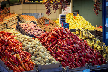 Vegetable stall in the Nagy VÃ¡sÃ¡rcsarnok (Central Market Hall) in Budapest (Hungary). Landscape format.